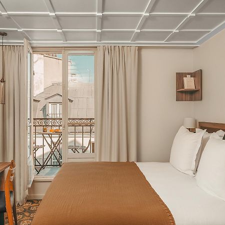 Hotel Du Savoir ปารีส ภายนอก รูปภาพ